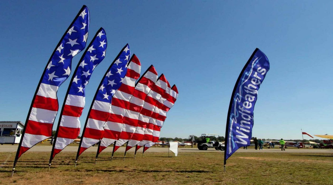 Double sided feather flags